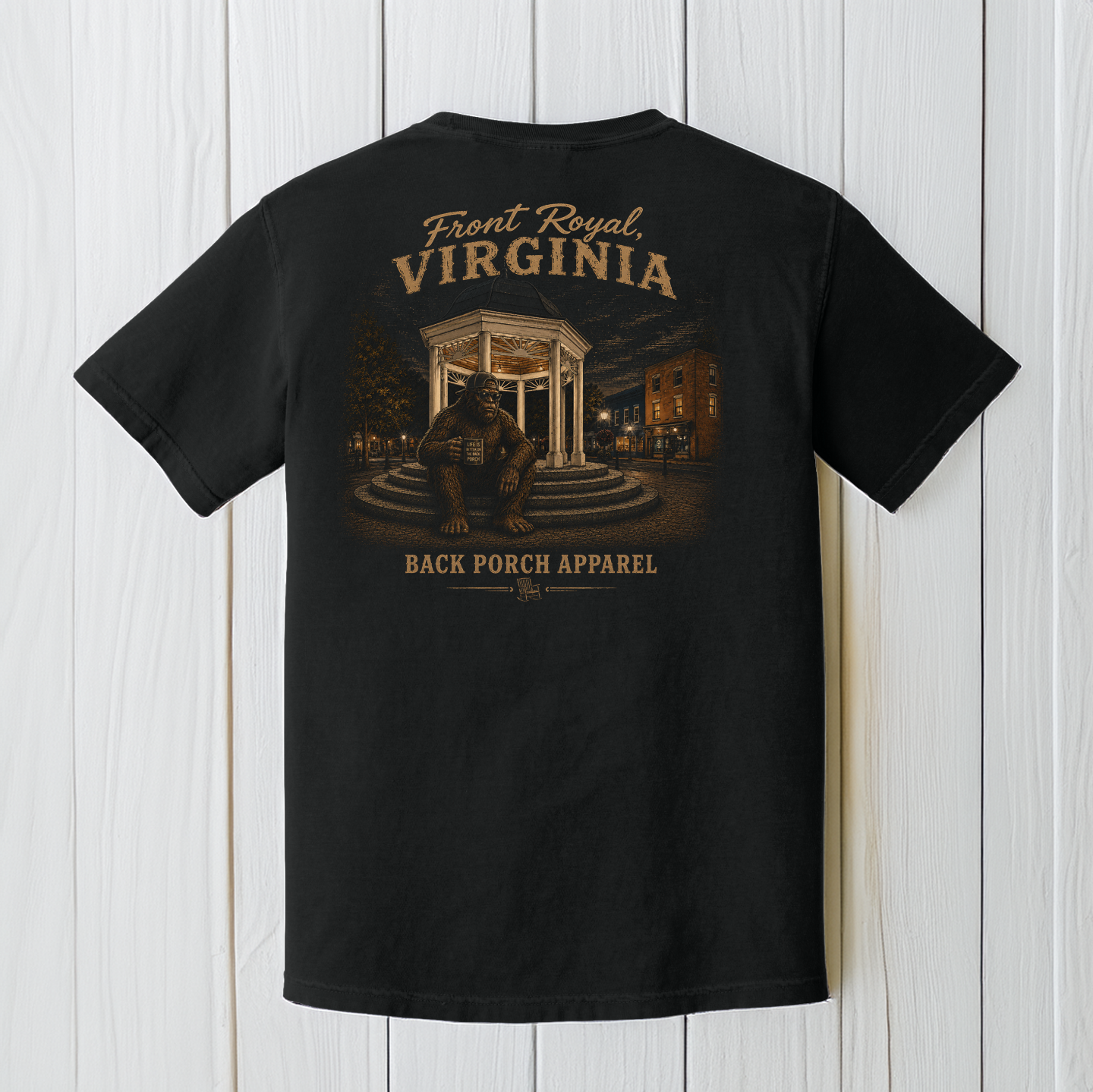 Black Comfort Colors t-shirt featuring a large distressed back graphic of Front Royal Virginia with the downtown gazebo and Bigfoot artwork by Back Porch Apparel.