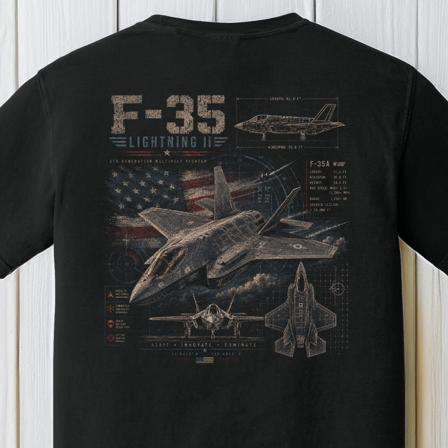 Detailed F-35 Lightning II fighter jet blueprint graphic with distressed American flag artwork on a black Comfort Colors shirt.