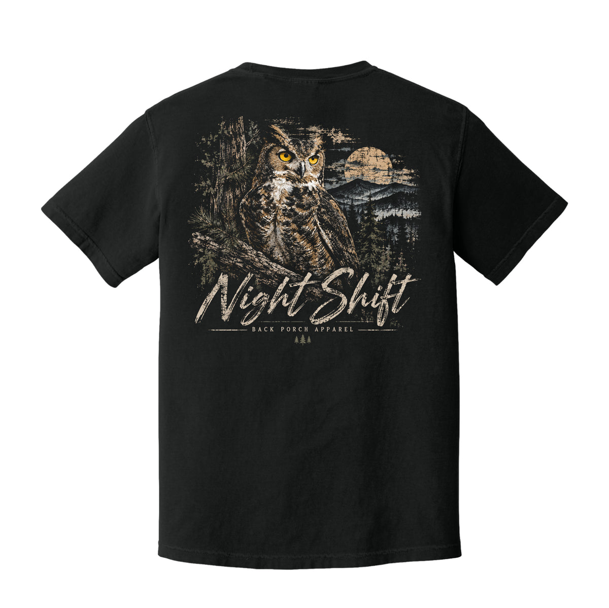 A black short-sleeve t-shirt shown from the back, featuring a large graphic print of an owl in a forest at night with a moon and the text 'Night Shift' and 'Back Patch Apparel'.