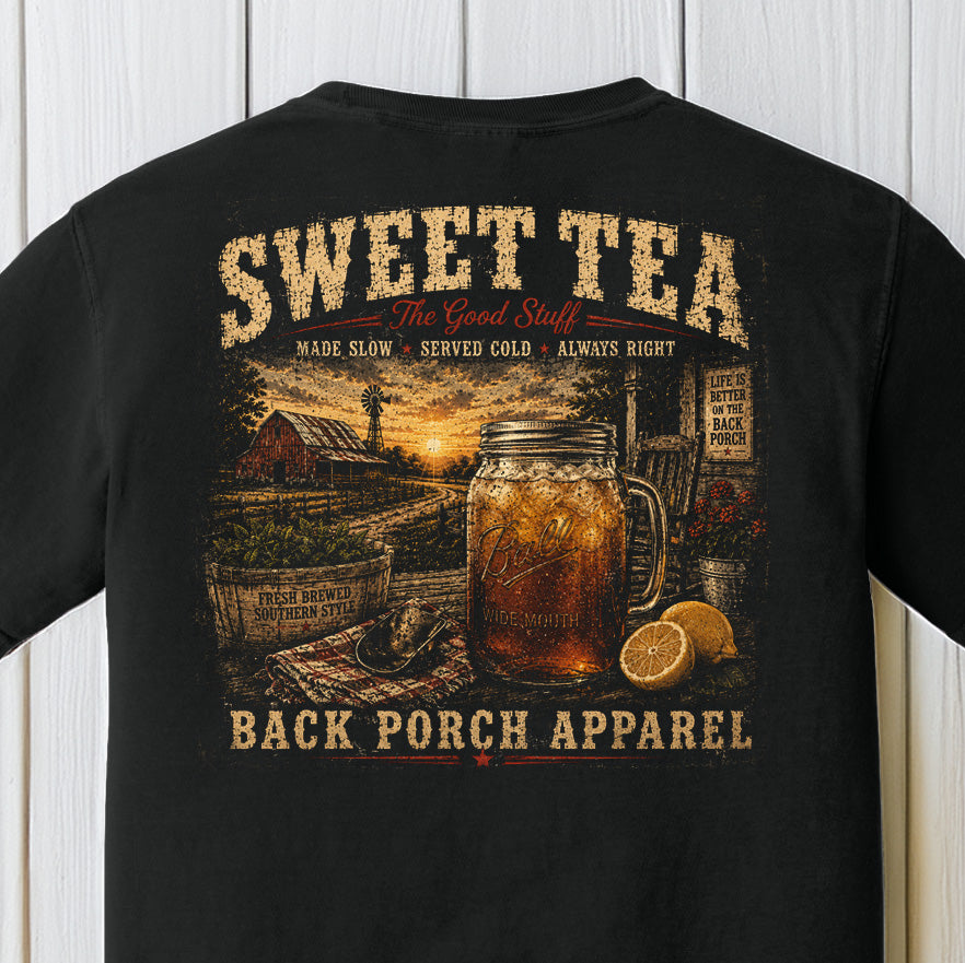 Distressed southern sweet tea graphic featuring a mason jar of iced tea, lemons, farmhouse sunset, and rustic porch artwork on a Comfort Colors black shirt.