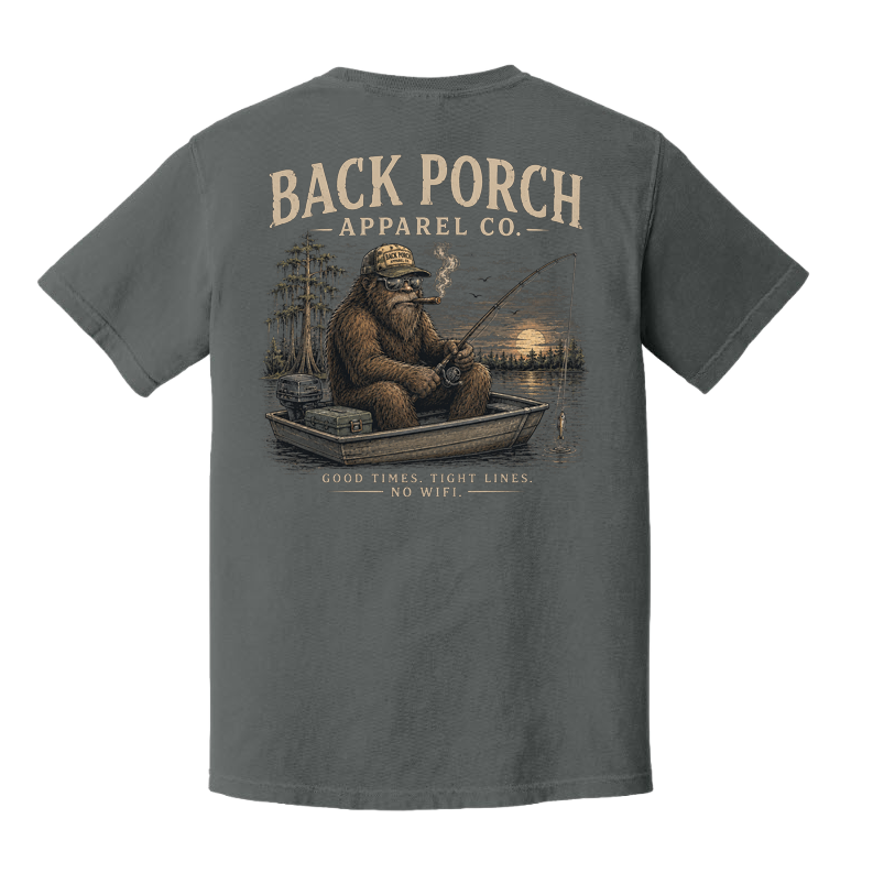 Back of Pepper Comfort Colors t-shirt featuring Bigfoot fishing from a jon boat with the words "Good Times. Tight Lines. No WiFi."