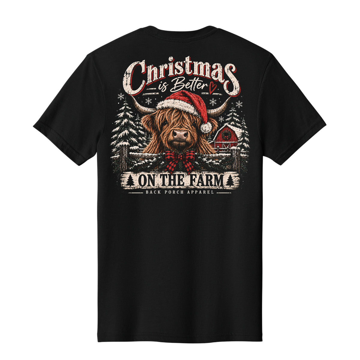 A black short-sleeve t-shirt shown from the back, featuring a large graphic print of a highland cow wearing a Santa hat in a snowy winter scene with the text 'Christmas is Better ON THE FARM' and 'Black Duck Apparel'.