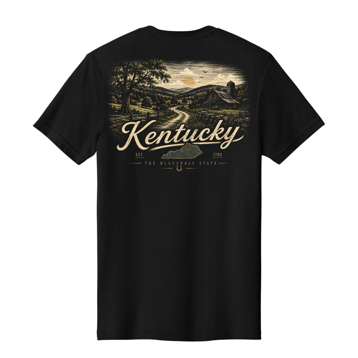 A black short-sleeve t-shirt shown from the back, featuring a vintage-style graphic of a Kentucky landscape with a winding road, trees, hills, and a barn, with 'Kentucky' written in large script across the center.
