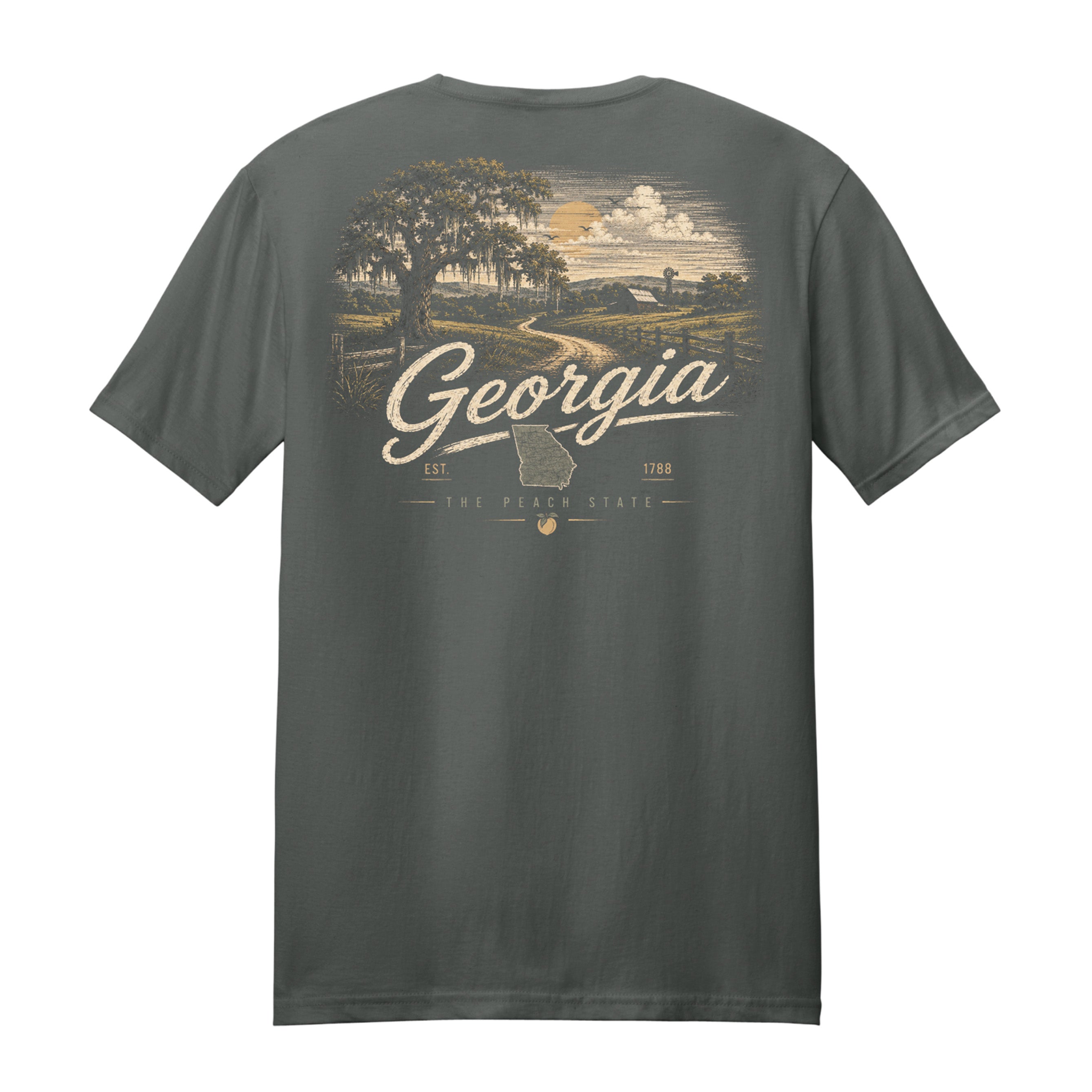 A dark gray crewneck t-shirt shown from the back, featuring a large graphic print of a Georgia landscape with a tree, fields, and the text 'Georgia' and 'The Peach State' in cream and light brown tones.