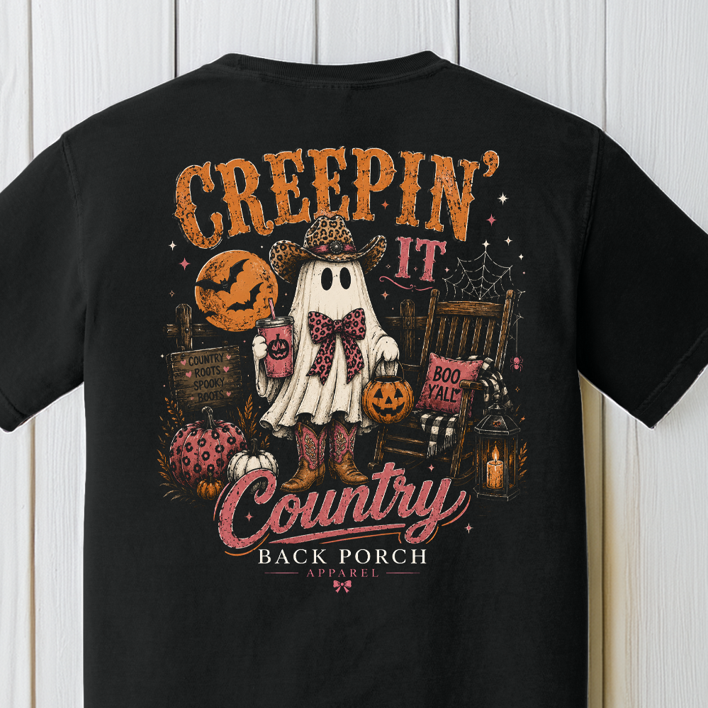Creepin' It Country Halloween shirt design with ghost in cowboy hat and boots, pumpkins and rocking chair