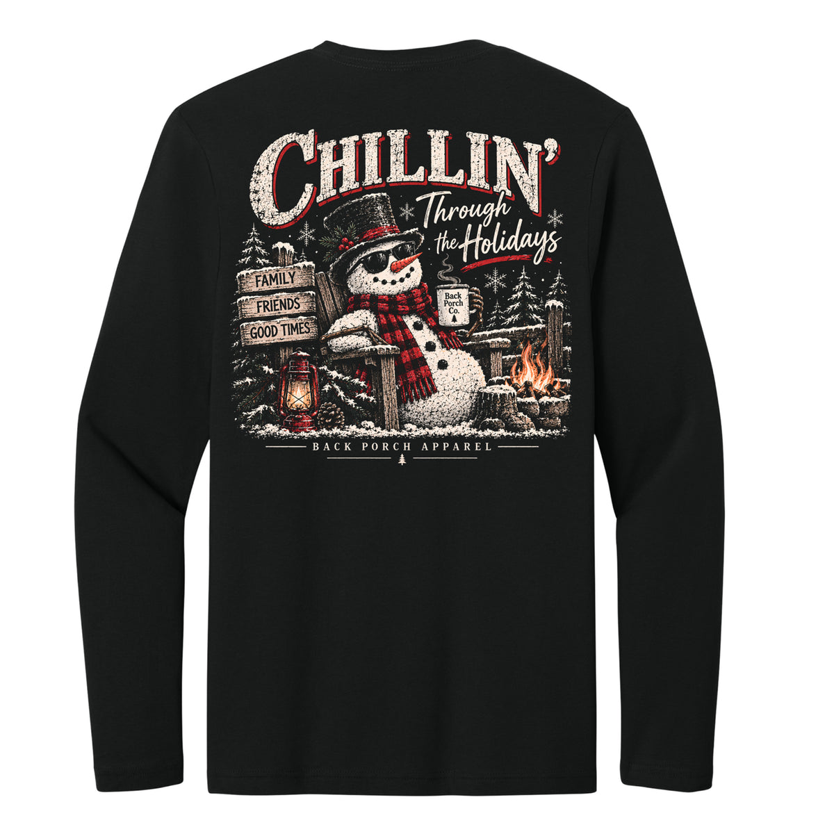 A black long-sleeve t-shirt shown from the back, featuring a large graphic print with a snowman, a campfire, and the text 'Chillin' Through the Holidays' and 'Black Forest Apparel'.