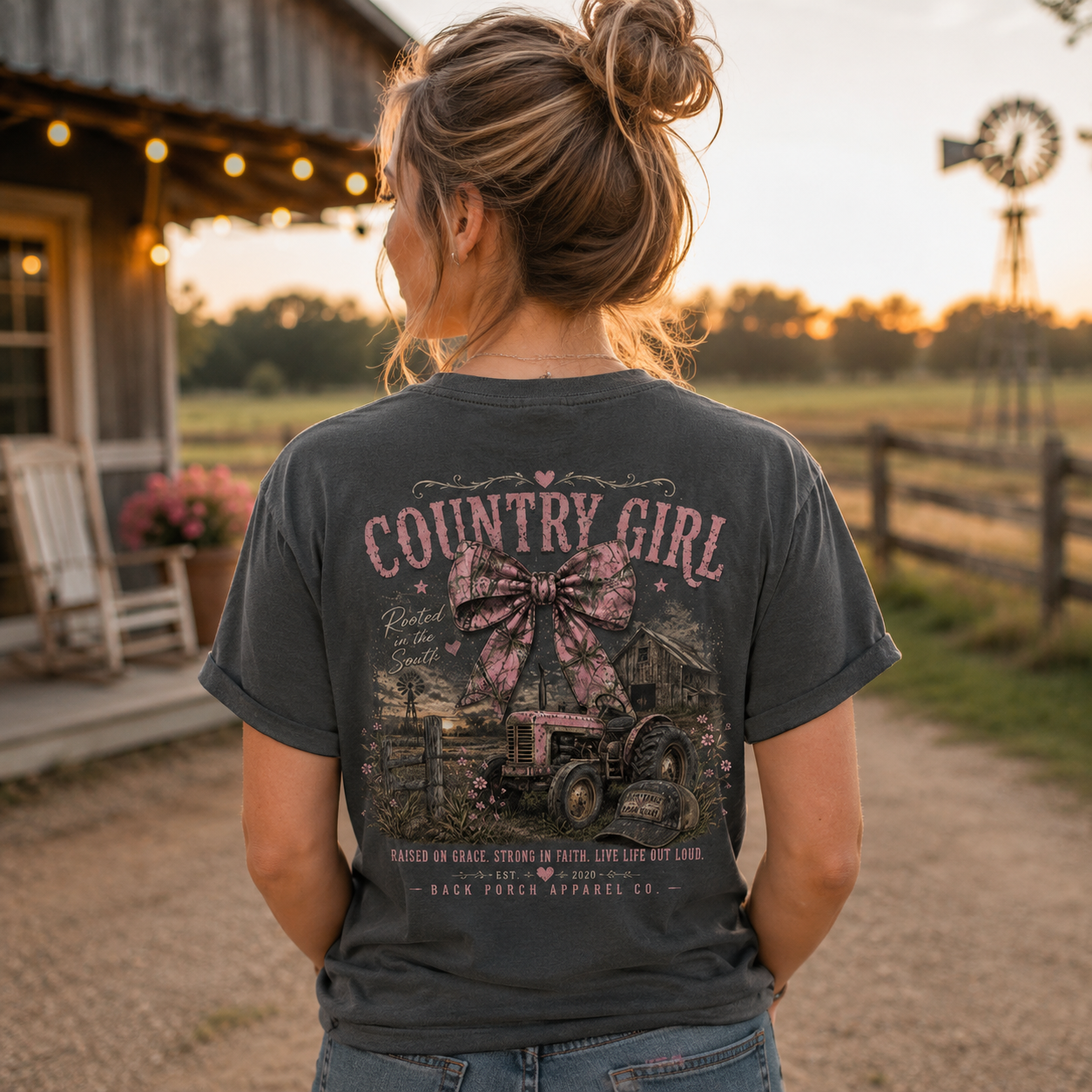 Woman wearing a Country Girl Back Porch Apparel comfort colors Shirt