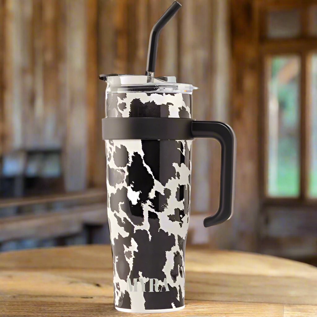 Myra Wide Wyoming 40oz Stainless Steel Tumbler in Black and White Cow