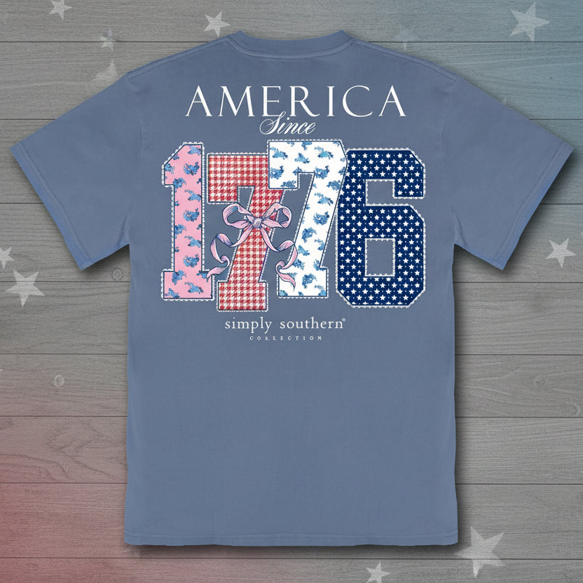 Simply Southern mineral washed overcast blue t-shirt with America Since 1776 patriotic graphic on the back