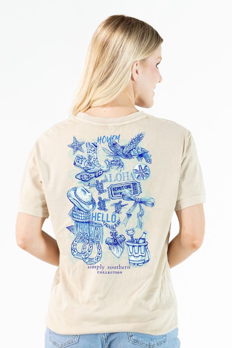 Simply Southern mineral wash bone t-shirt with blue coastal icons graphic on back and small sea turtle graphic on front