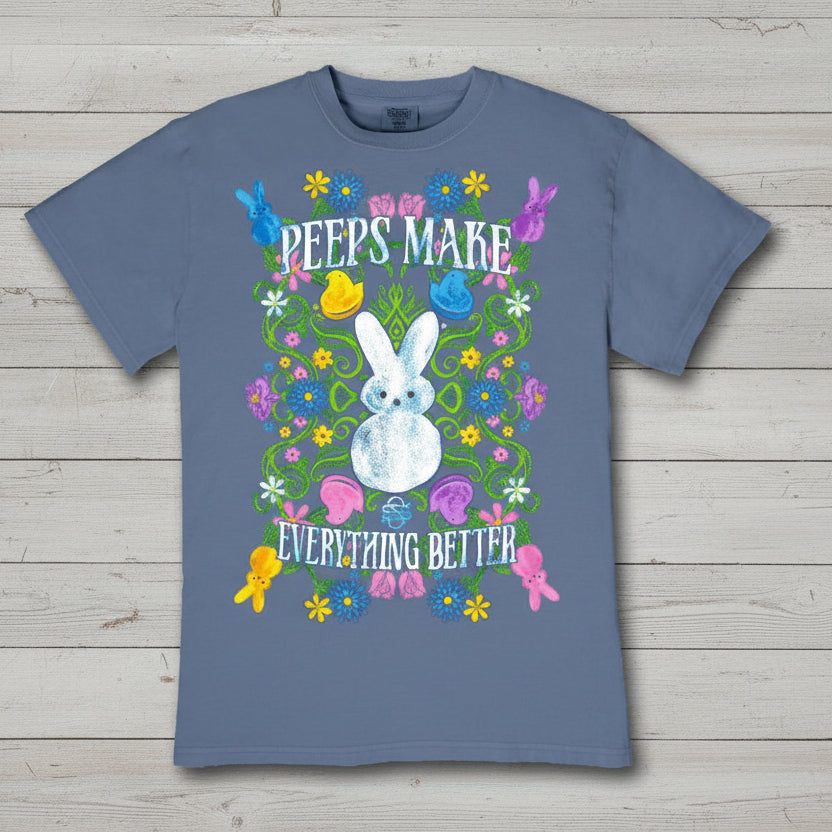 Overcast blue short sleeve t-shirt featuring colorful Peeps bunny graphic and “Peeps Make Everything Better” text