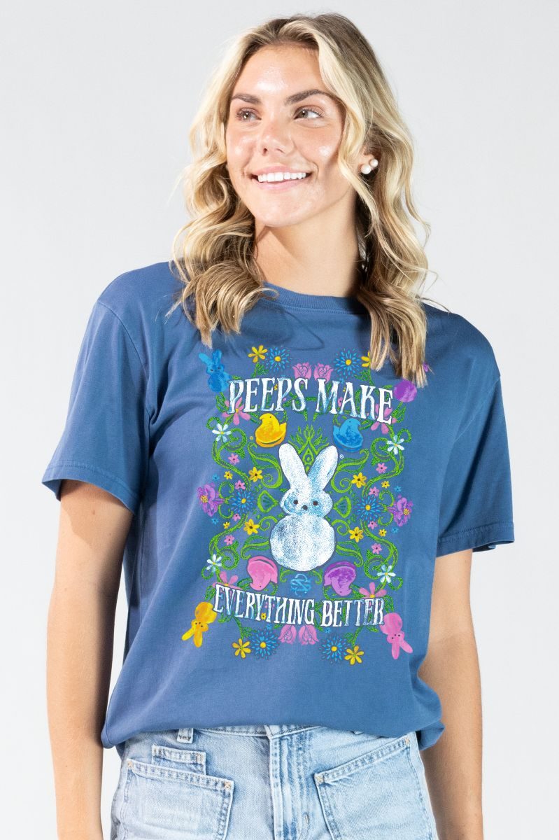 Model wearing Peeps Make Everything Better graphic t-shirt with colorful bunny and floral design
