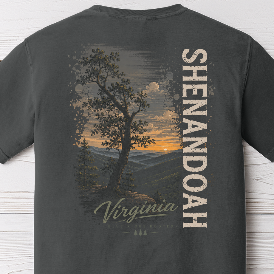 Close-up of Shenandoah Virginia sunset graphic on Comfort Colors Pepper t-shirt with Blue Ridge mountain landscape and vintage typography.