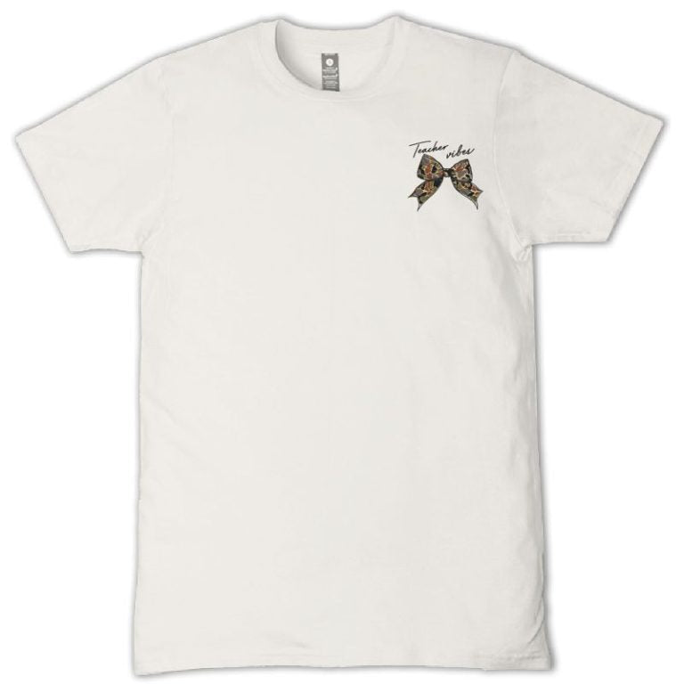 Simply Southern linen t-shirt with small Teacher Vibes bow and apple chest graphic