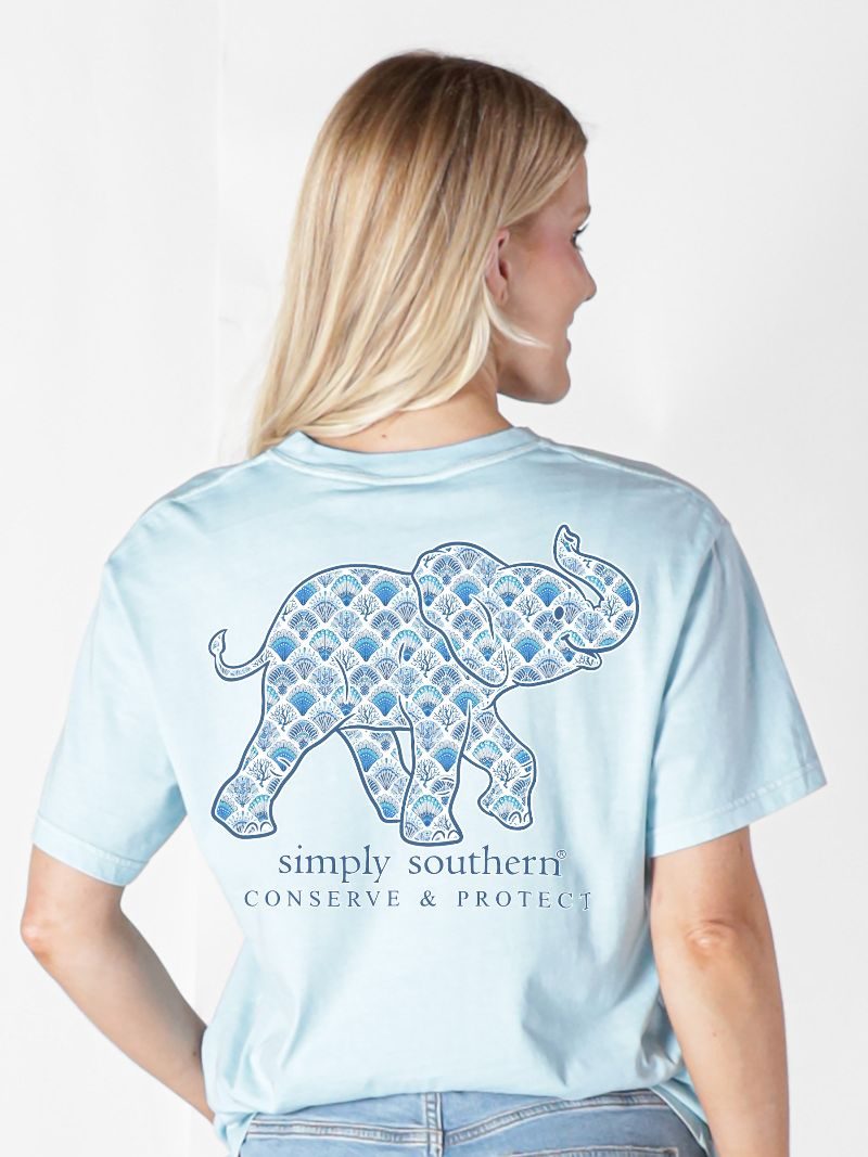 Model wearing Simply Southern elephant animal conservation T-shirt showing back wildlife design
