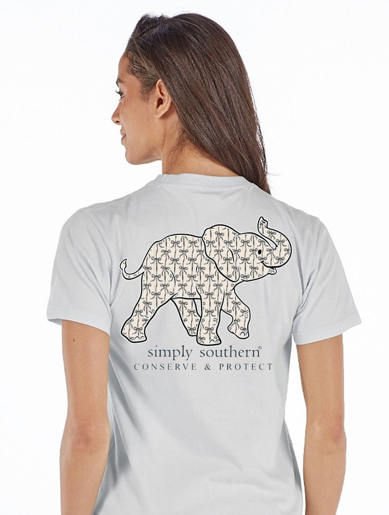 Simply Southern Conserve & Protect elephant graphic with bow pattern on light-colored short sleeve t-shirt