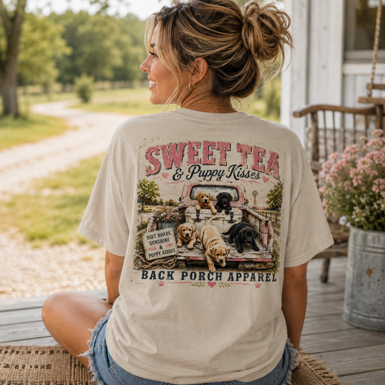 Woman wearing a Sweet Tea and Puppy Kisses Back Porch Apparel Shirt