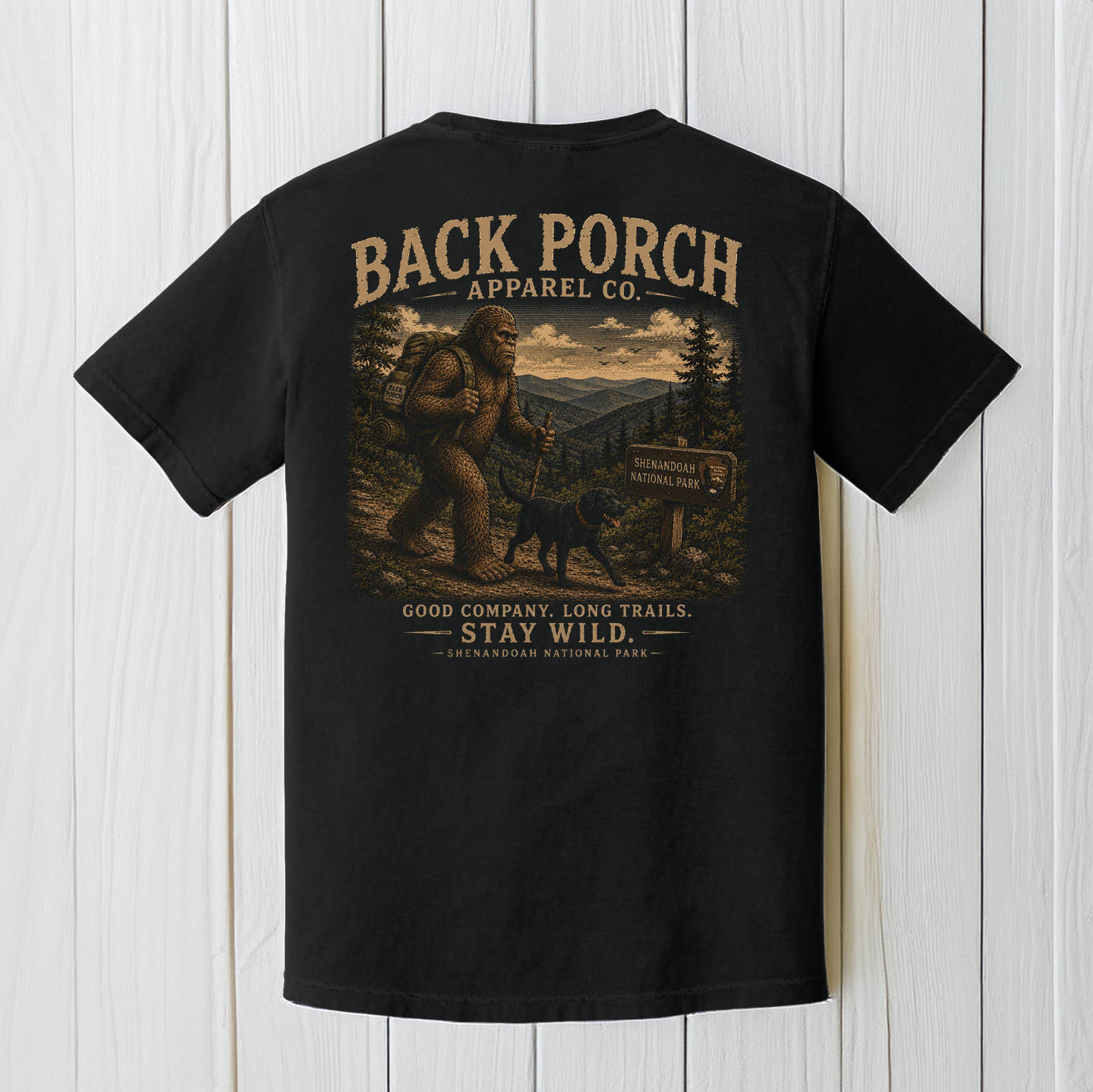 Bigfoot hiking in the shenandoah national park with a black lab tshirt full shirt view