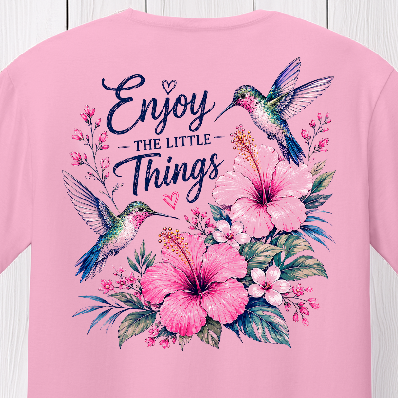 Hummingbird and floral artwork with Enjoy The Little Things message surrounded by colorful flowers and garden-inspired details