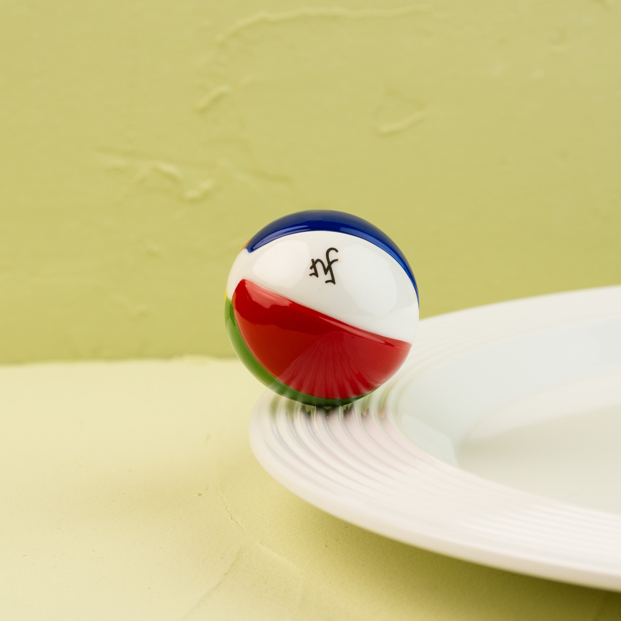 Nora Fleming Beach, Please! Mini displayed on a white Nora Fleming platter, perfect for summer entertaining and beach-themed gatherings