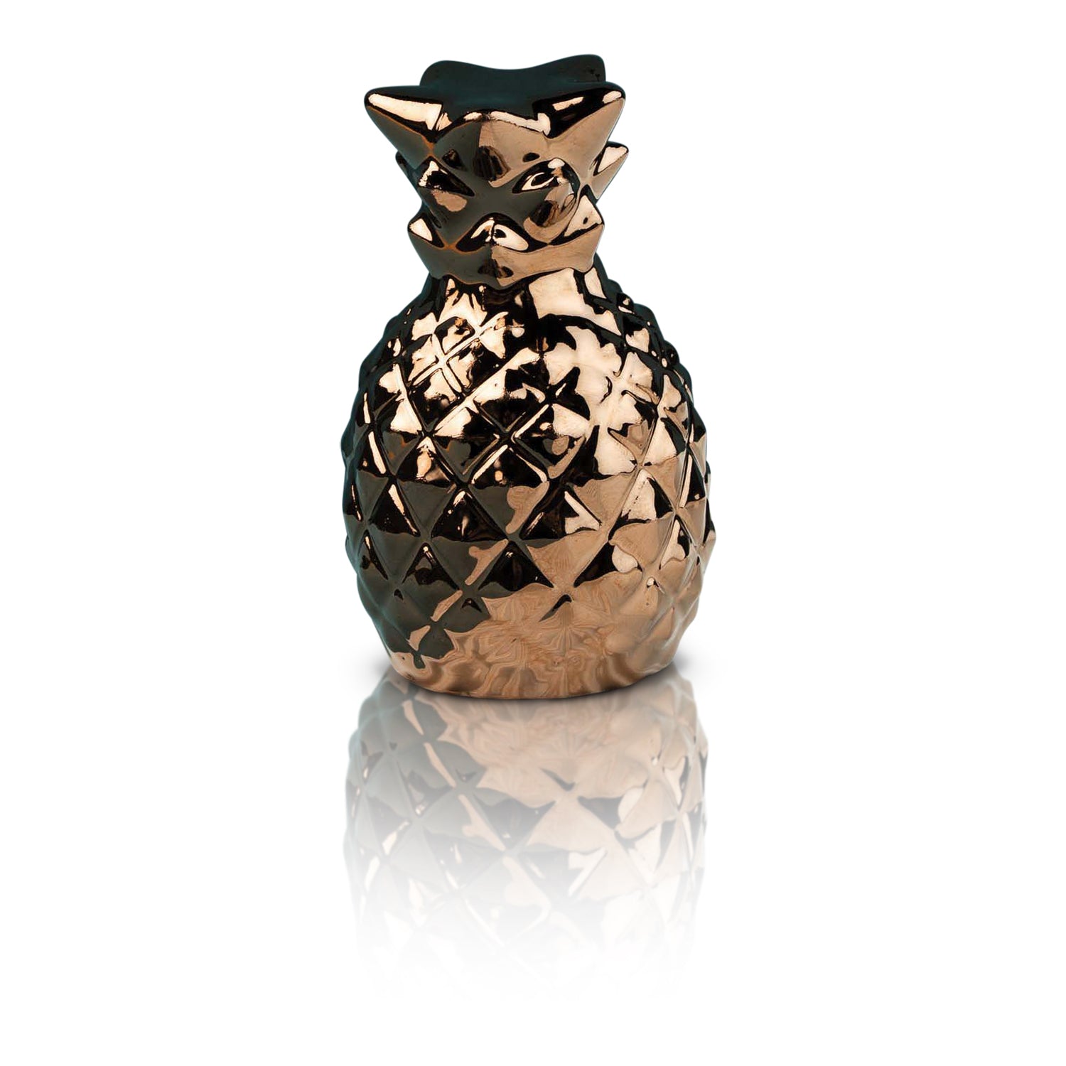 Close-up of Nora Fleming Luxe Hospitality metallic bronze pineapple mini on a white serving platter