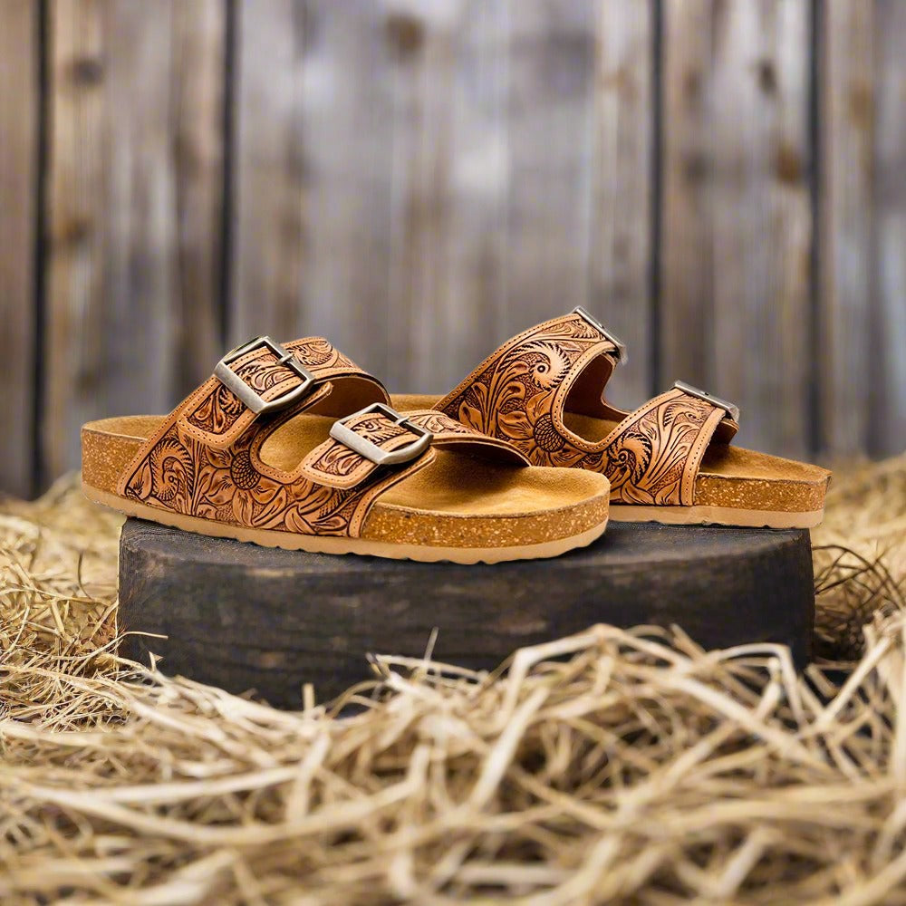 Footo Hand Tooled Sandals in a barn