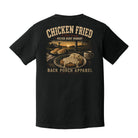 Back view of a black Comfort Colors t-shirt featuring a vintage chicken fried steak southern country design by Back Porch Apparel.