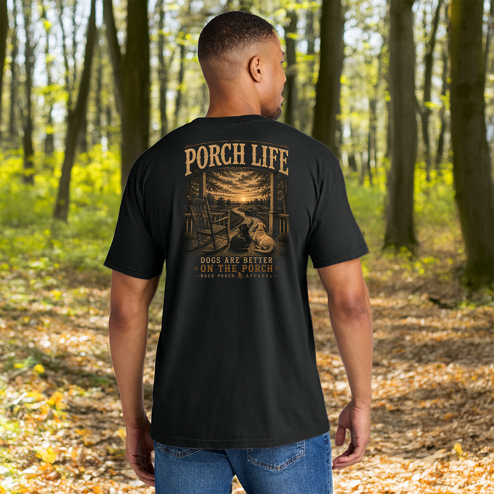 Model wearing a Back Porch Apparel Porch Life Dogs are Better on the Porch Comfort Colors Shirt