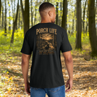 Model wearing a Back Porch Apparel Porch Life Dogs are Better on the Porch Comfort Colors Shirt