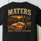 Distressed southern porch graphic featuring tomato sandwiches, homegrown tomatoes, mason jar drink, and farmhouse sunset artwork on a Comfort Colors black shirt.
