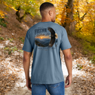 Model wearing a Back Porch Apparel Rooted in Freedom T-Shirt on Blue Jean Comfort colors