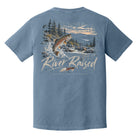 A blue short-sleeve t-shirt shown from the back, featuring a large graphic print of a jumping fish, mountains, trees, and the text 'River Raised' with 'Rise Fish Experts' underneath.