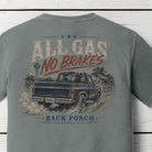 Close-up of the All Gas No Brakes graphic on a Grey Comfort Colors t-shirt showing a vintage pickup truck kicking up dust, farmhouse, windmill, and Back Porch Apparel Co. branding.