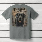 Back view of the Faithful and True Comfort Colors Grey t-shirt featuring a black Lab walking through the woods.