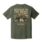 Back view of a Moss Comfort Colors t-shirt displayed on a white background featuring a distressed military helmet and American flag design with patriotic typography by Back Porch Apparel.