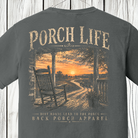 Close-up of the Porch Life Dirt Roads Lead to the Porch artwork showing a rocking chair, front porch, winding dirt road, and country sunset.