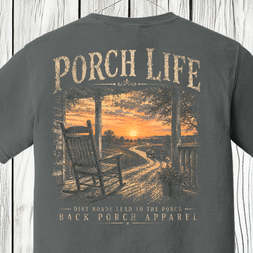 Close-up of the Porch Life Dirt Roads Lead to the Porch artwork showing a rocking chair, front porch, winding dirt road, and country sunset.