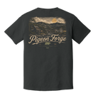 A dark charcoal gray t-shirt shown from the back, featuring a large vintage-style graphic of a mountain landscape with the text 'Pigeon Forge Tennessee' in a distressed beige font.