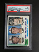 1982 Topps Orioles Future Stars #21 graded PSA 8, featuring Cal Ripken Jr., Bob Bonner, and Jeff Schneider on the front