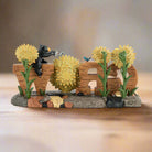 Bearfoots Grow with Sunflowers Bear Figurine by Jeff Fleming
