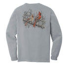 A light gray long-sleeve t-shirt shown from the back, featuring a graphic print of two red cardinals perched on a snowy branch.