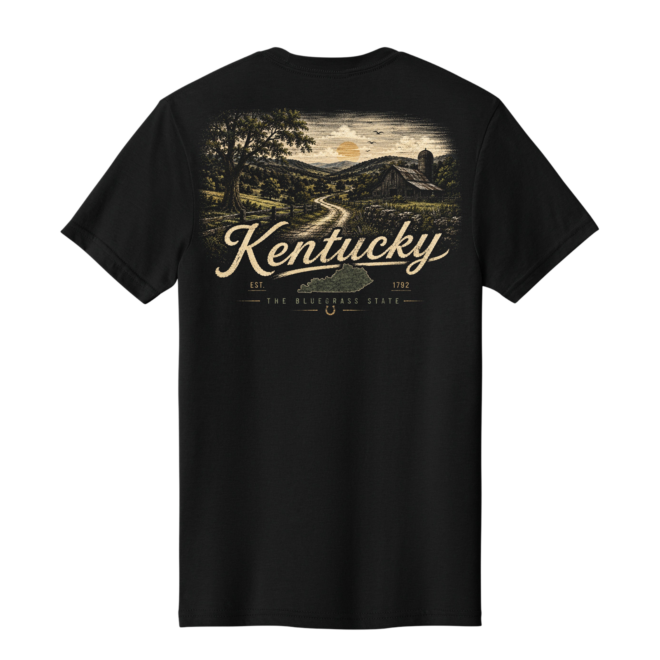 A black short-sleeve t-shirt shown from the back, featuring a vintage-style graphic of a Kentucky landscape with a winding road, trees, hills, and a barn, with 'Kentucky' written in large script across the center.