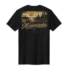 A black short-sleeve t-shirt shown from the back, featuring a large vintage-style Minnesota graphic print with a sunset over water, trees, and the word 'Minnesota' in tan lettering.