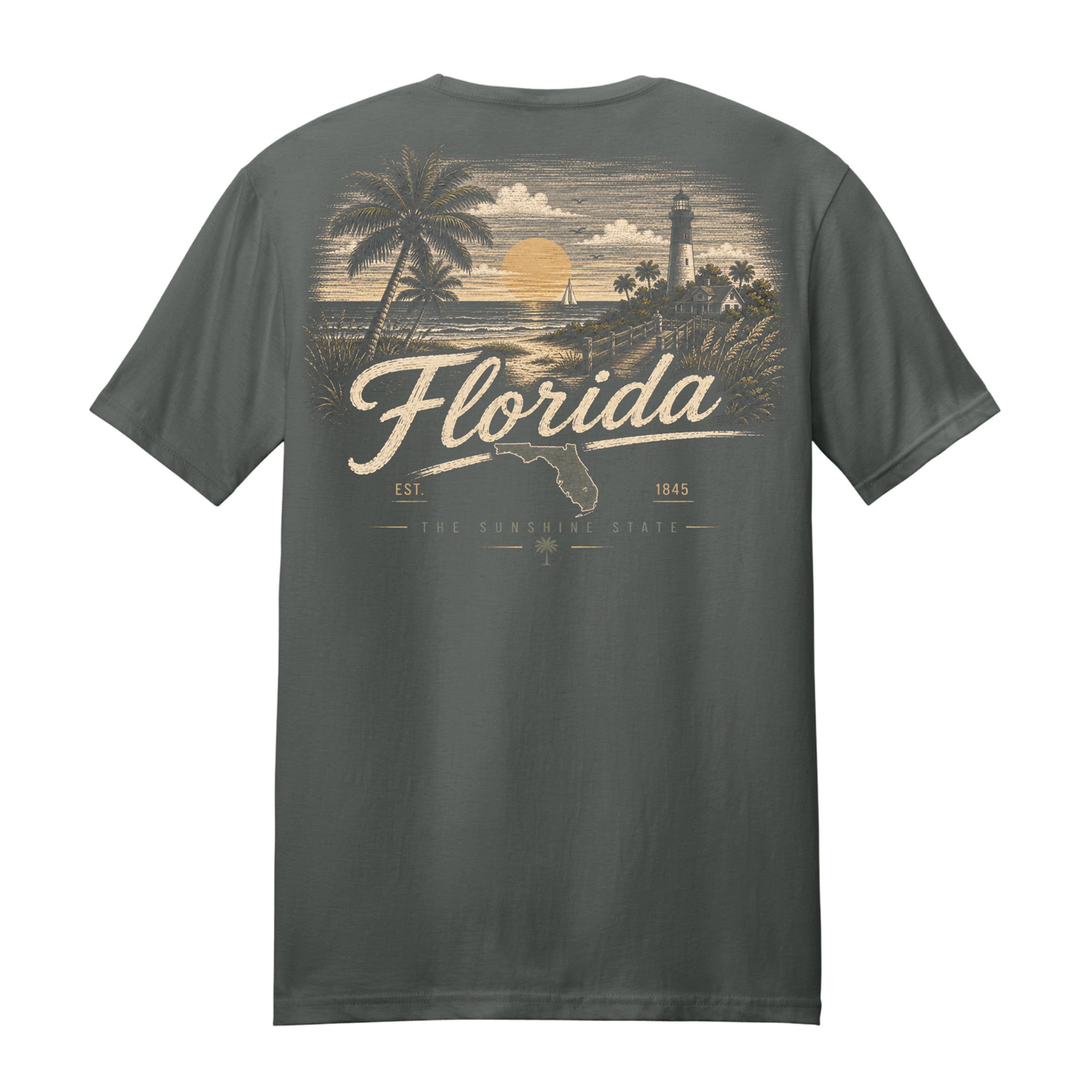 A dark gray t-shirt shown from the back, featuring a vintage-style graphic print of a Florida beach scene with palm trees, a lighthouse, and a sunset, with 'Florida' written in large script.