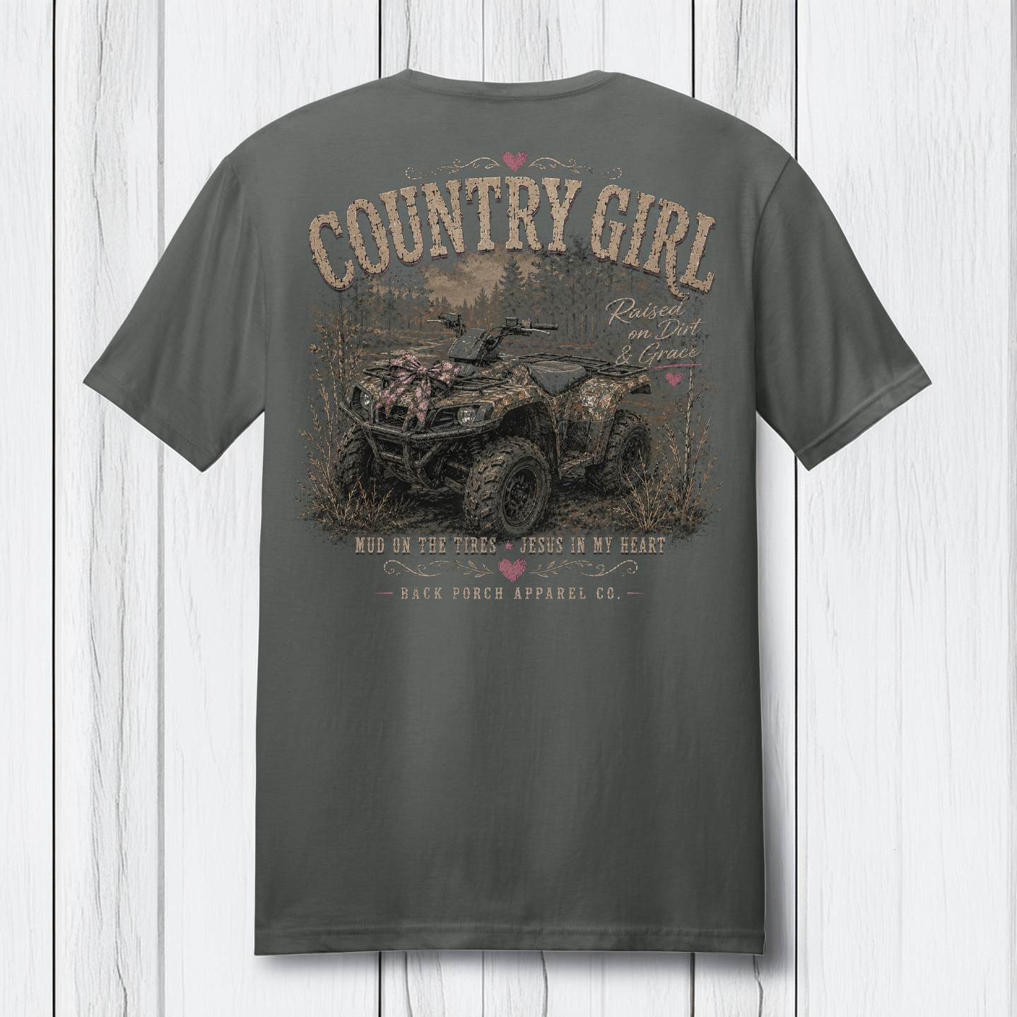 Charcoal gray Comfort Colors t-shirt featuring a large distressed back graphic with a camouflage four wheeler, rustic outdoor artwork, and vintage southern country girl lettering.
