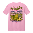 Pink 100% ring-spun cotton t-shirt with "Pickles Make Me Happy" back graphic featuring pickle jars, smiling pickle slices, floral accents, and rustic typography by Back Porch Apparel.