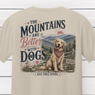 Close-up of "The Mountains Are Better With Dogs" graphic featuring a Golden Retriever wearing a bandana in the Blue Ridge Mountains with rustic typography and Back Porch Apparel branding.