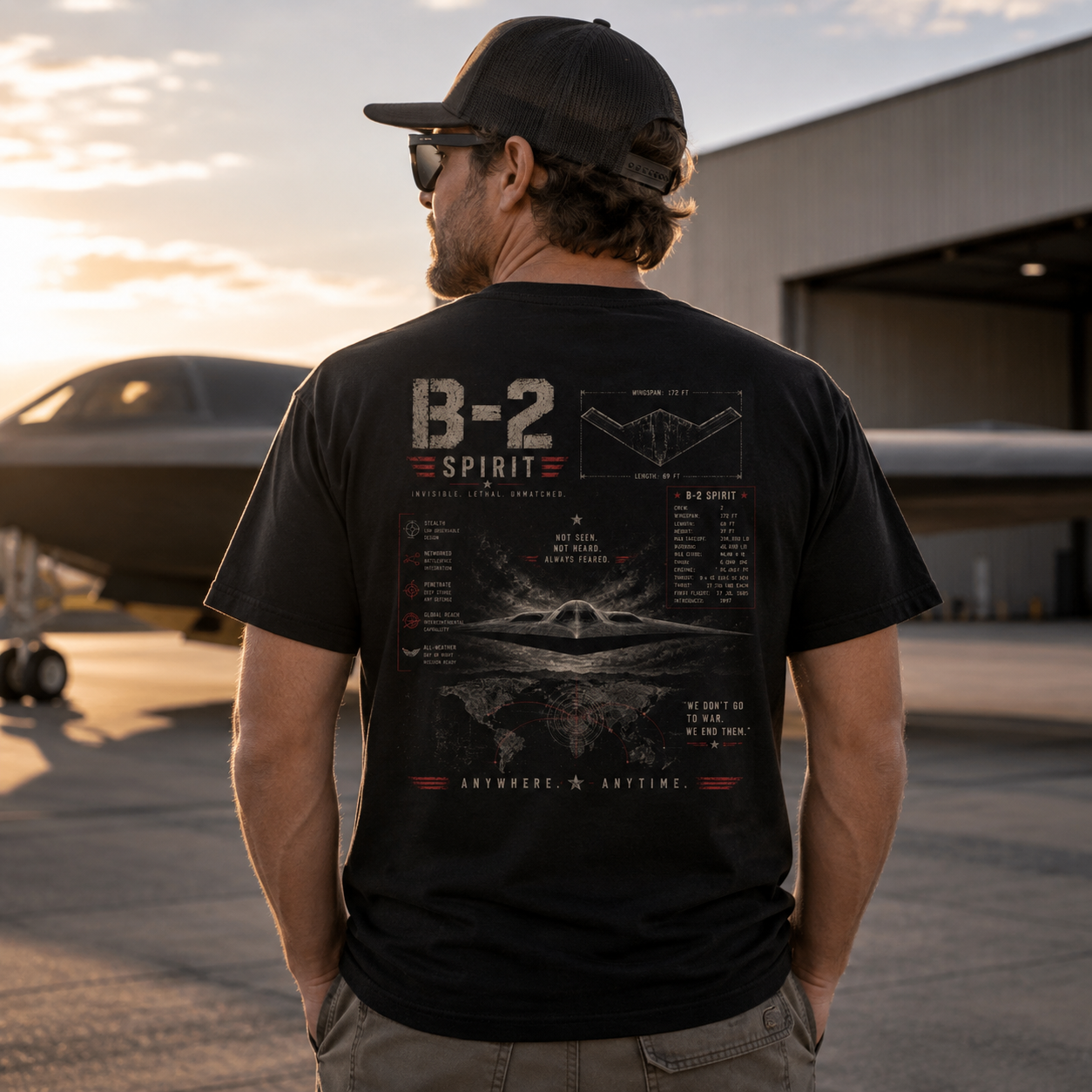 Man wearing a B-2 Stealth Bomber Back Porch Apparel Comfort Colors Shirt
