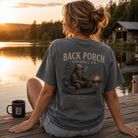 Woman wearing a Bigfoot Fishing Back Porch Apparel Comfort Colors Shirt