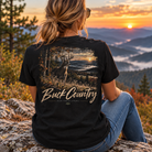 Woman wearing a Buck Country back Porch Apparel Comfort colors Black shirt